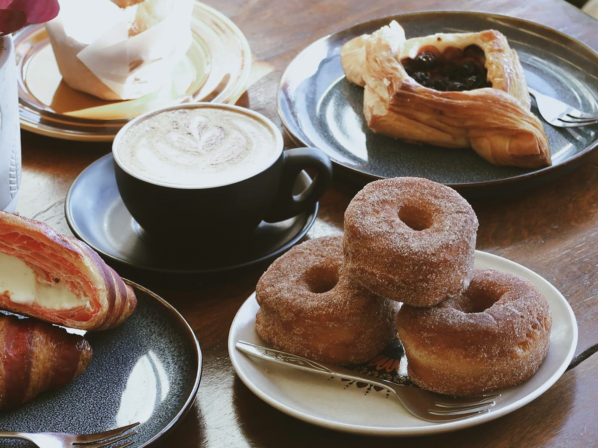 Table of plates and cups of coffee