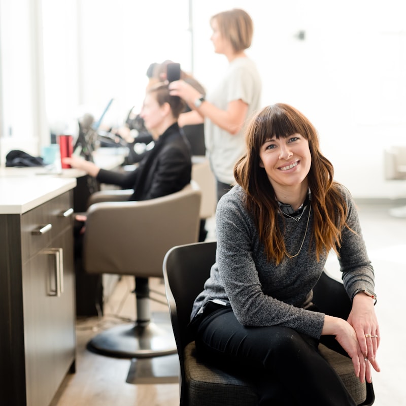 Smiling client in the salon chair