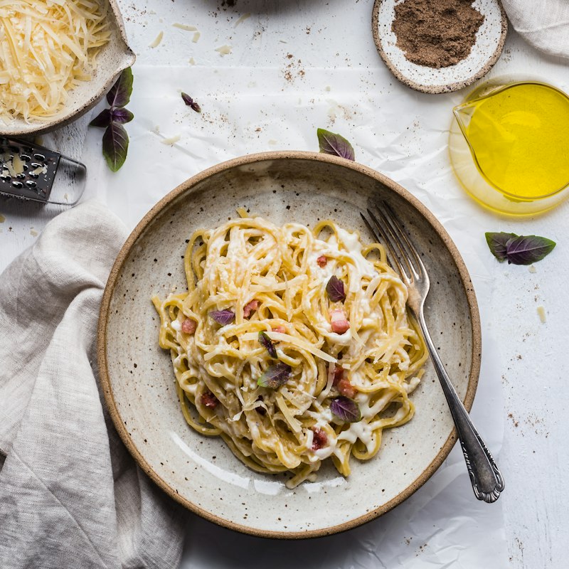 A plate of pasta with herbs